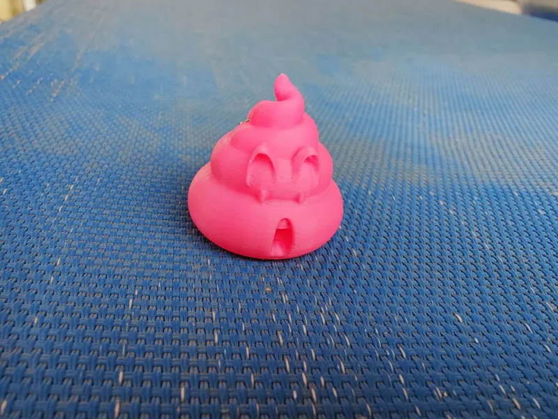 Arale poop keychain