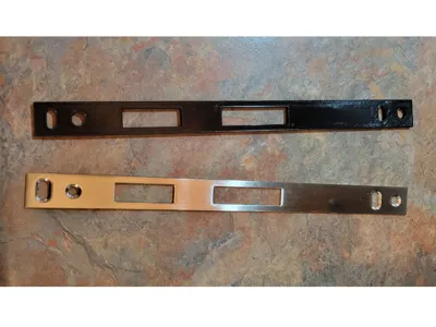 Strike plate for Andersen Emco storm door