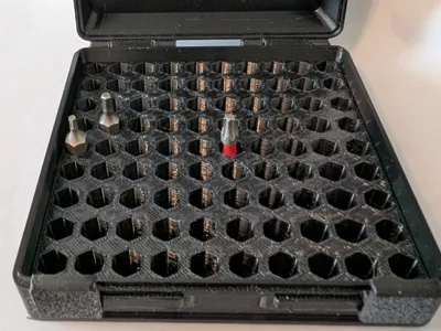 Hex bit storage box w/hex spaces