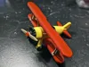 toy plane - four plates with different settings for the parts