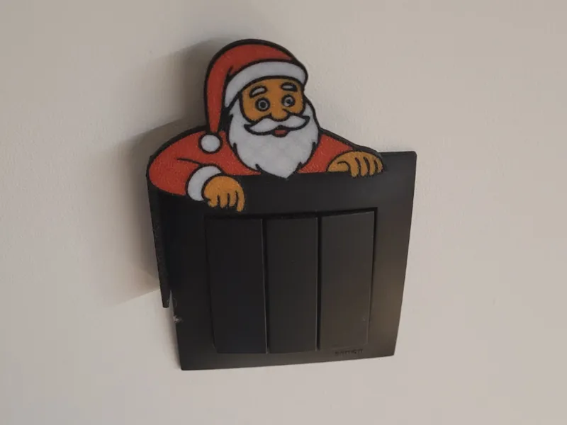 Santa Claus Christmas light switch / outlet decor