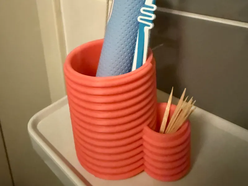 Toothbrush and toothpick holder 