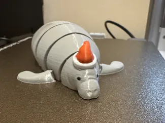 Articulated Manatee with Santa Hat