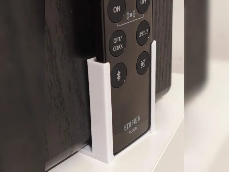 No-glue Edifier remote holder under-speaker