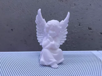 sitting angel with wings