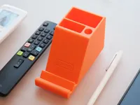 Support compact pour télécommandes et téléphone — photo 2