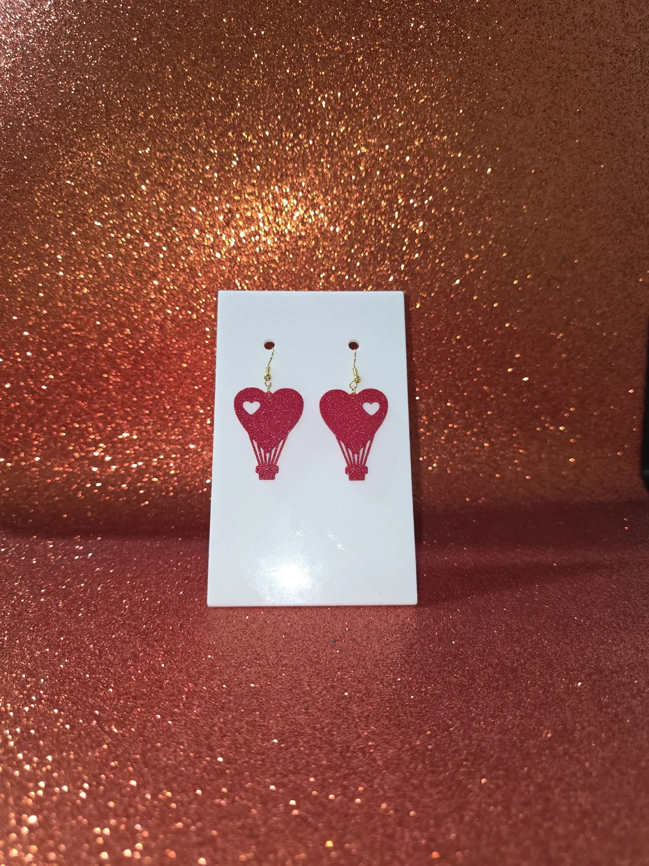 Heart balloon earrings view 2