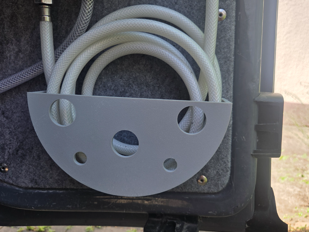 Schlauchhalterung Camper
