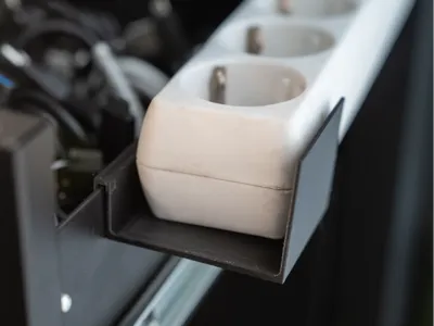 Power strip holder on 2mm cabin