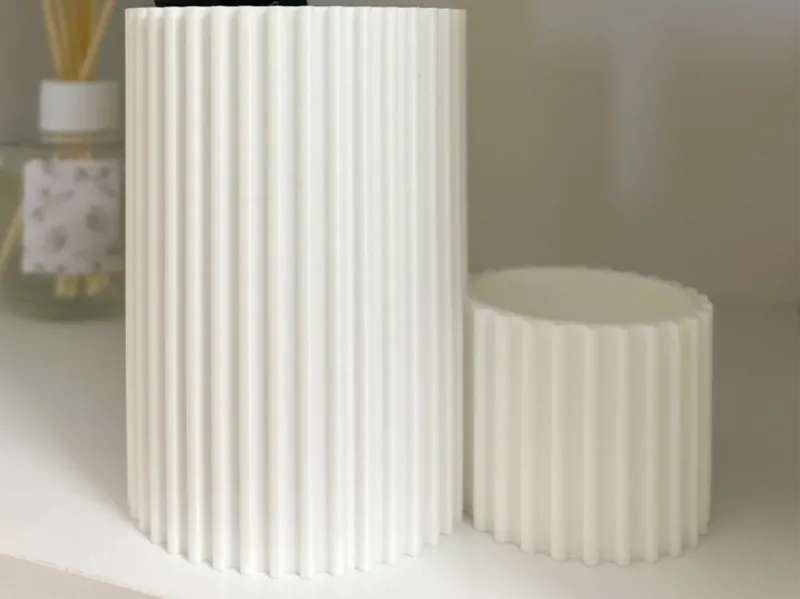 A modern container for toothbrushes and toothpaste