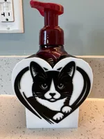 Improved Tuxedo Cat now with ironing