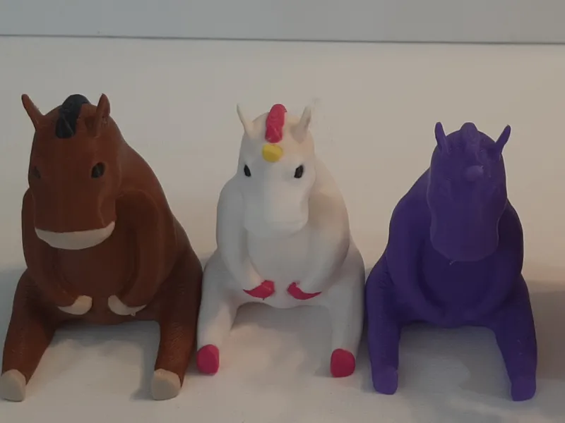Sitting Unicorn and Horse