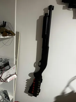 Vertical shotgun wall mount
