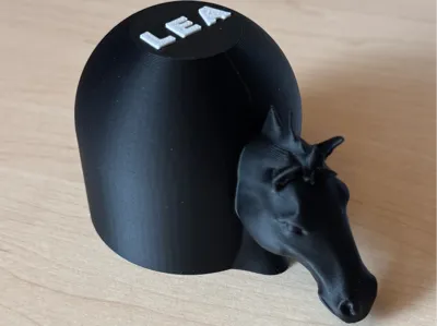 Trailer hitch cover with horse head