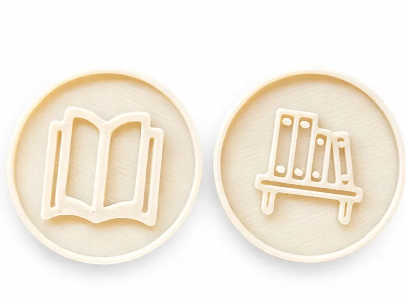 Coin with book