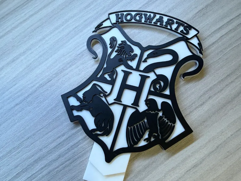 hogwarts harry potter logo con base