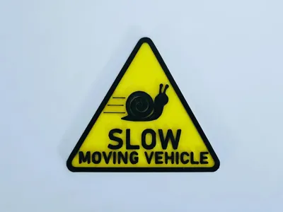 Slow vehicle snail sign