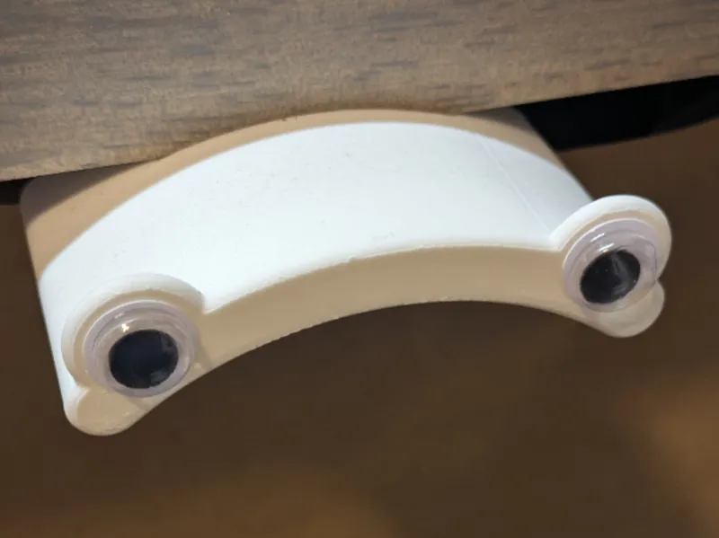 Low - profile headphone holder - desk mount