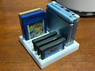 GBA SP and Games Holder