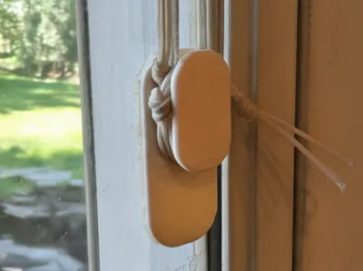 Low profile blind cord hook