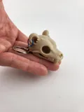Ключодържател с форма на череп на мечка