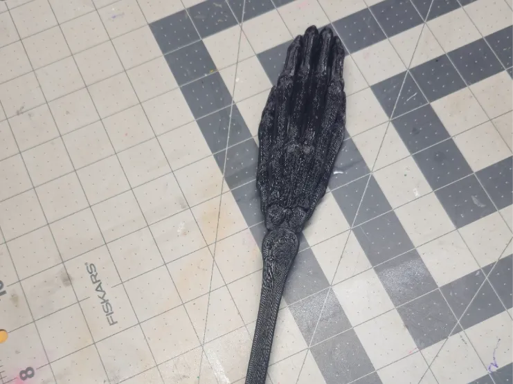 skeleton arm back scratcher