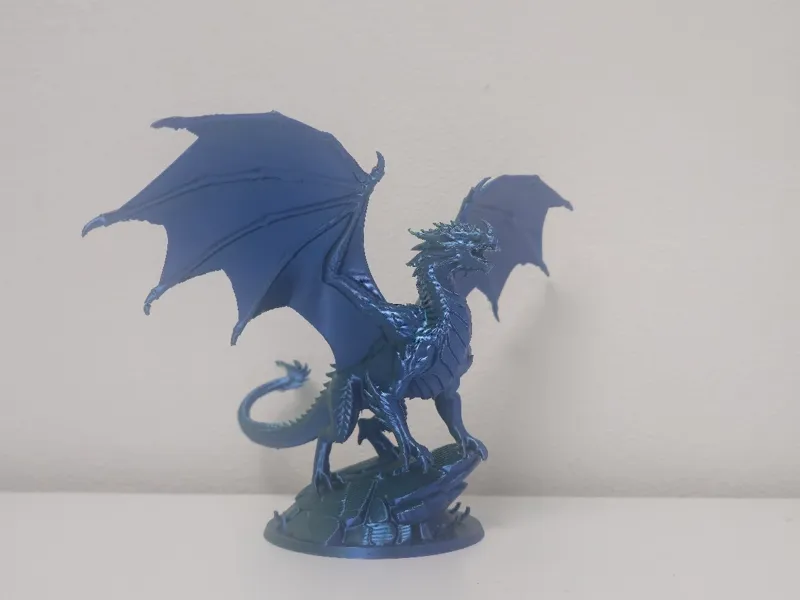 Majestic Blue Silk Dragon on Rock