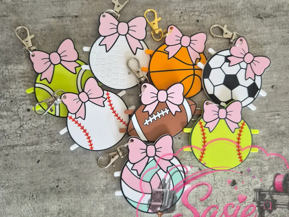Accesorio para sujetar ligas de cabello: Sports Hair Tie Holder Keychain. Referencia del modelo original.