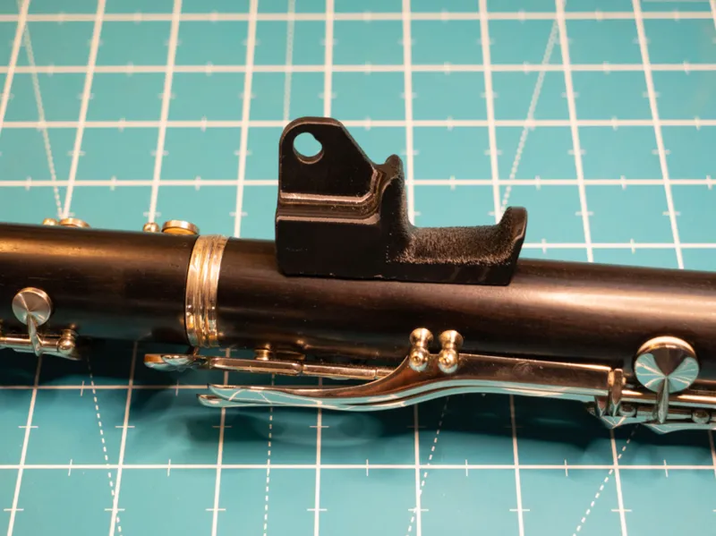 Thumbrest and neck strap mount for Bb Clarinet