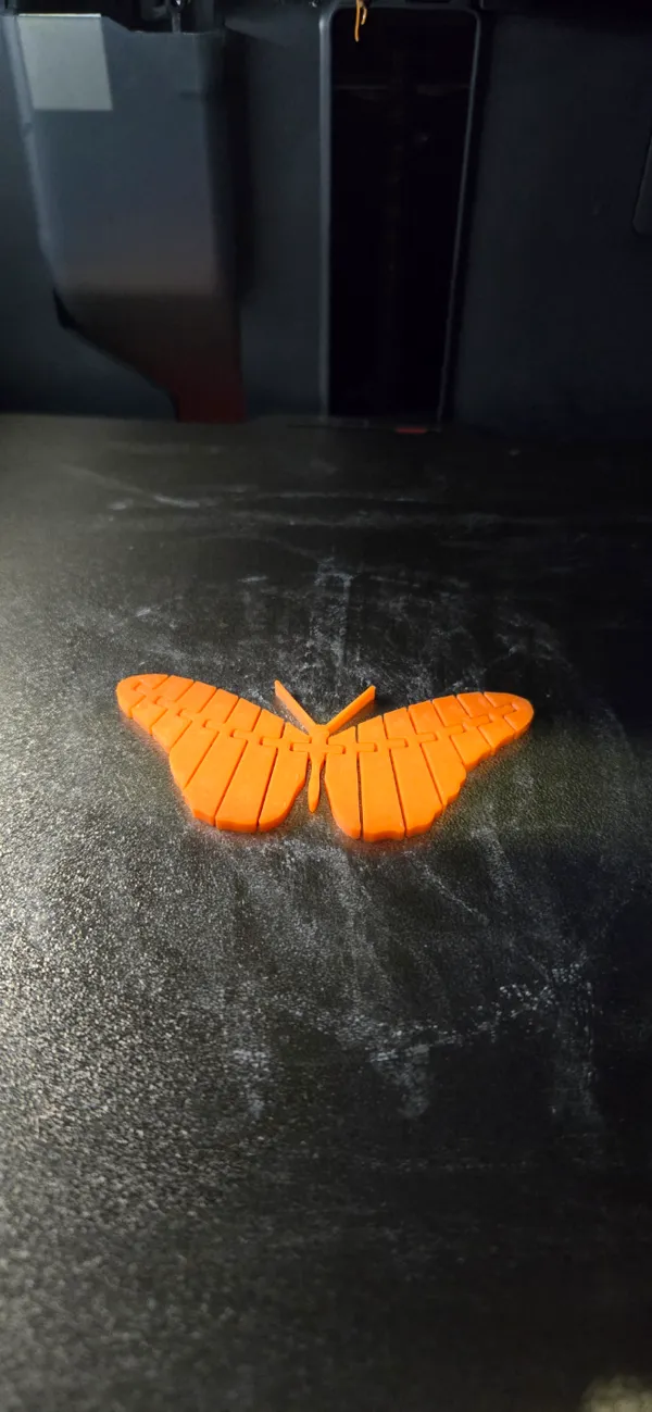 Papillon aux ailes mobiles