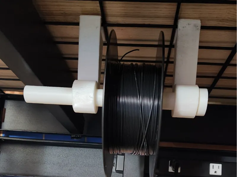 Spool Hanger for shelving rack