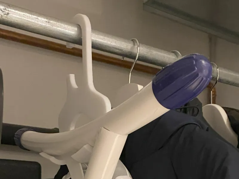Ironing board hanger
