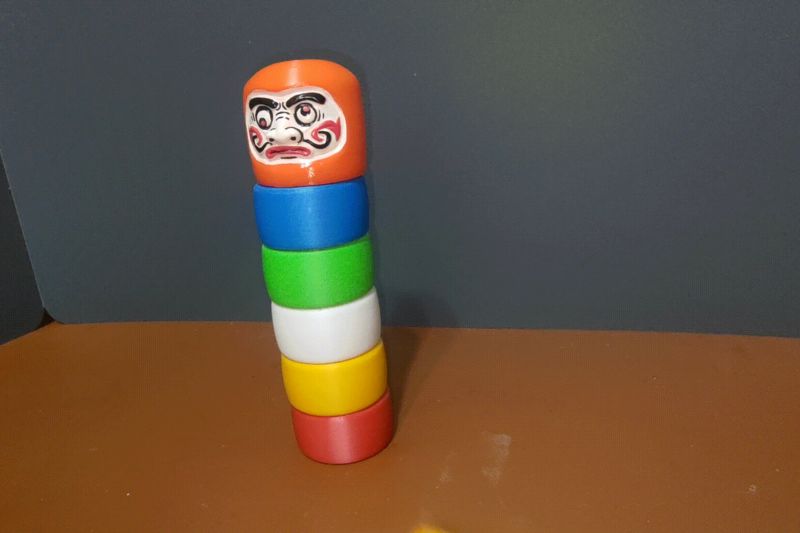 Daruma Drop, Japanese Daruma Otoshi toy.