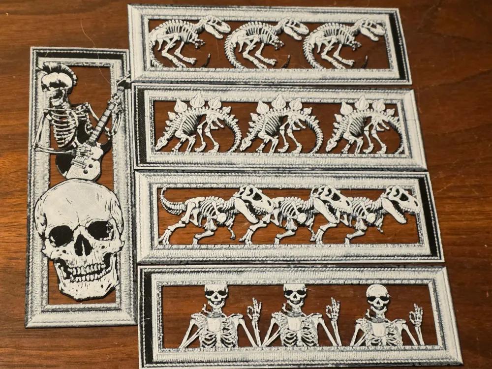 Accesorio de lectura: Framed Skeleton Bookmarks Set of 6 Black/White. Referencia del modelo original.