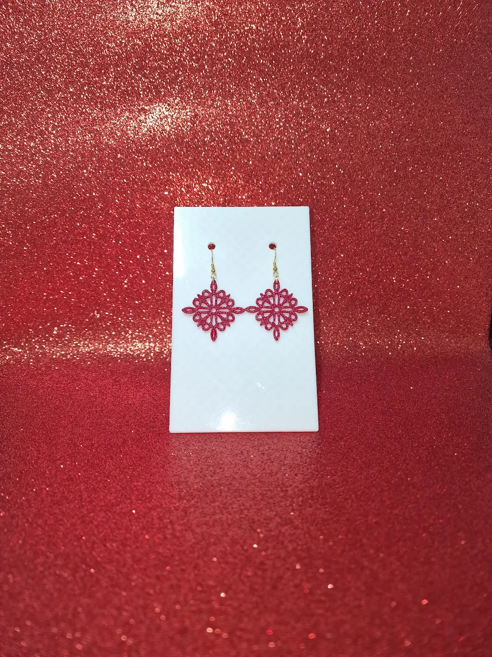 Stylized flower earrings view 2