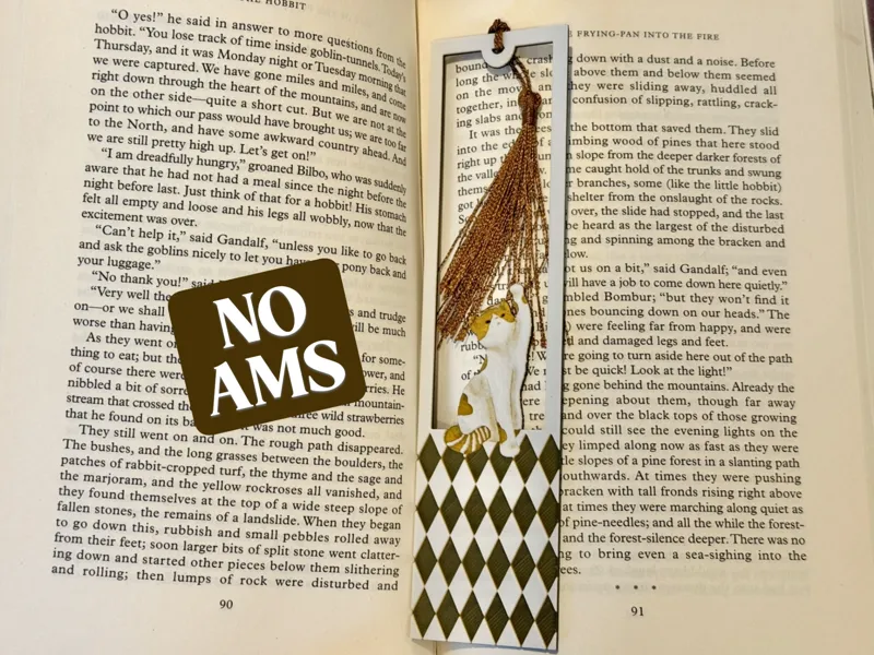 Playful Cat Bookmark: Cat Plays with Tassel no ams