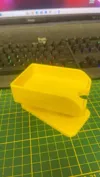 Card shoe and raised rotating draw pile
