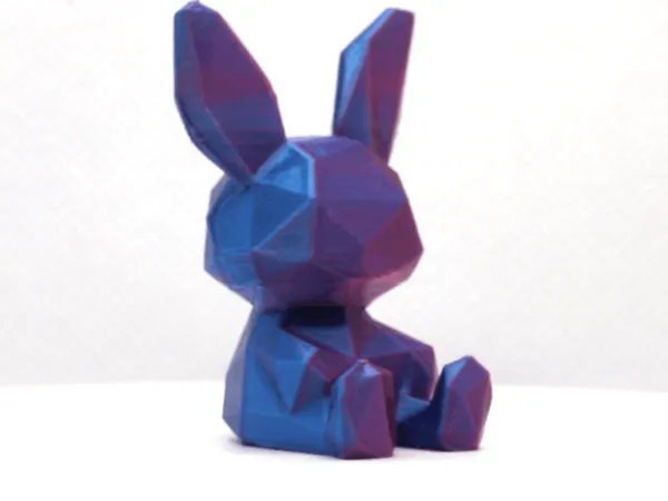 Lapin assis low poly