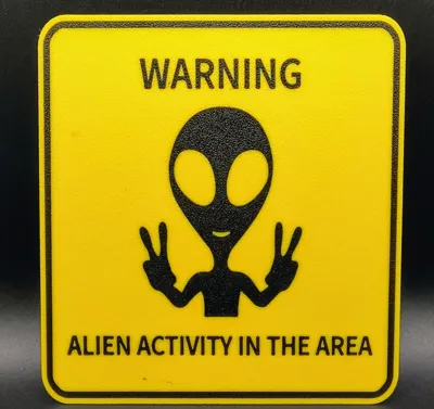 Warning Alien Activity in the area sign