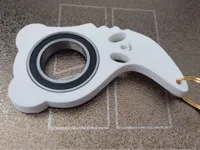 Porte-clés spinner panda en forme de karambit — photo 2