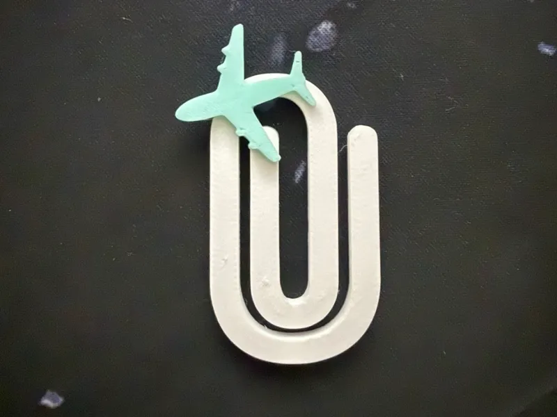 Clip marca pagina avião