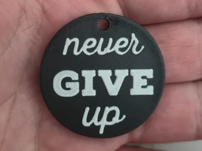 Never Give Up Keychain Free Commercial License
