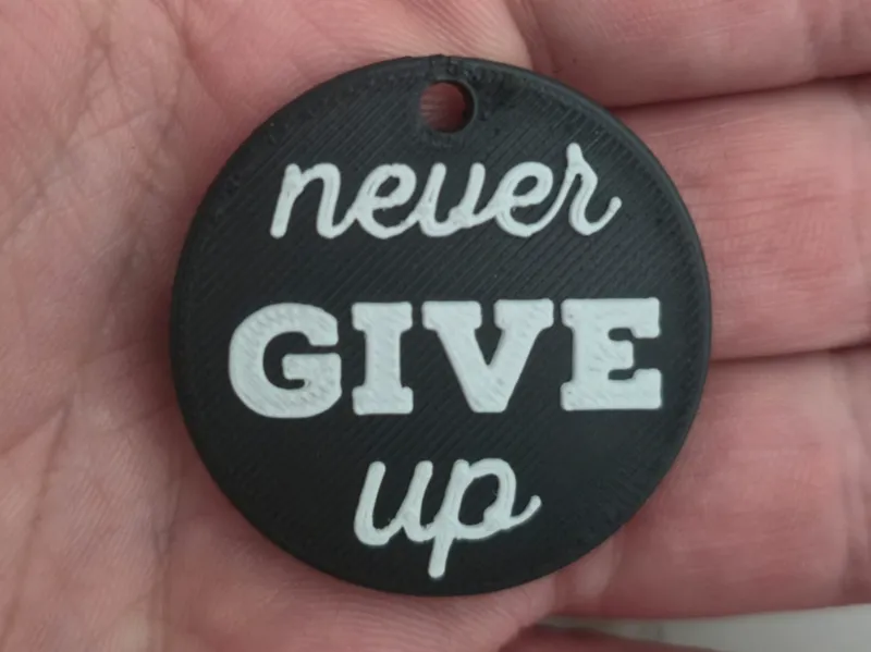 Never Give Up Keychain Free Commercial License