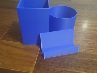 Futuristic pen and card holder