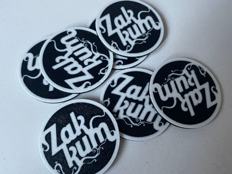 Zakkum keychain, coaster or badge