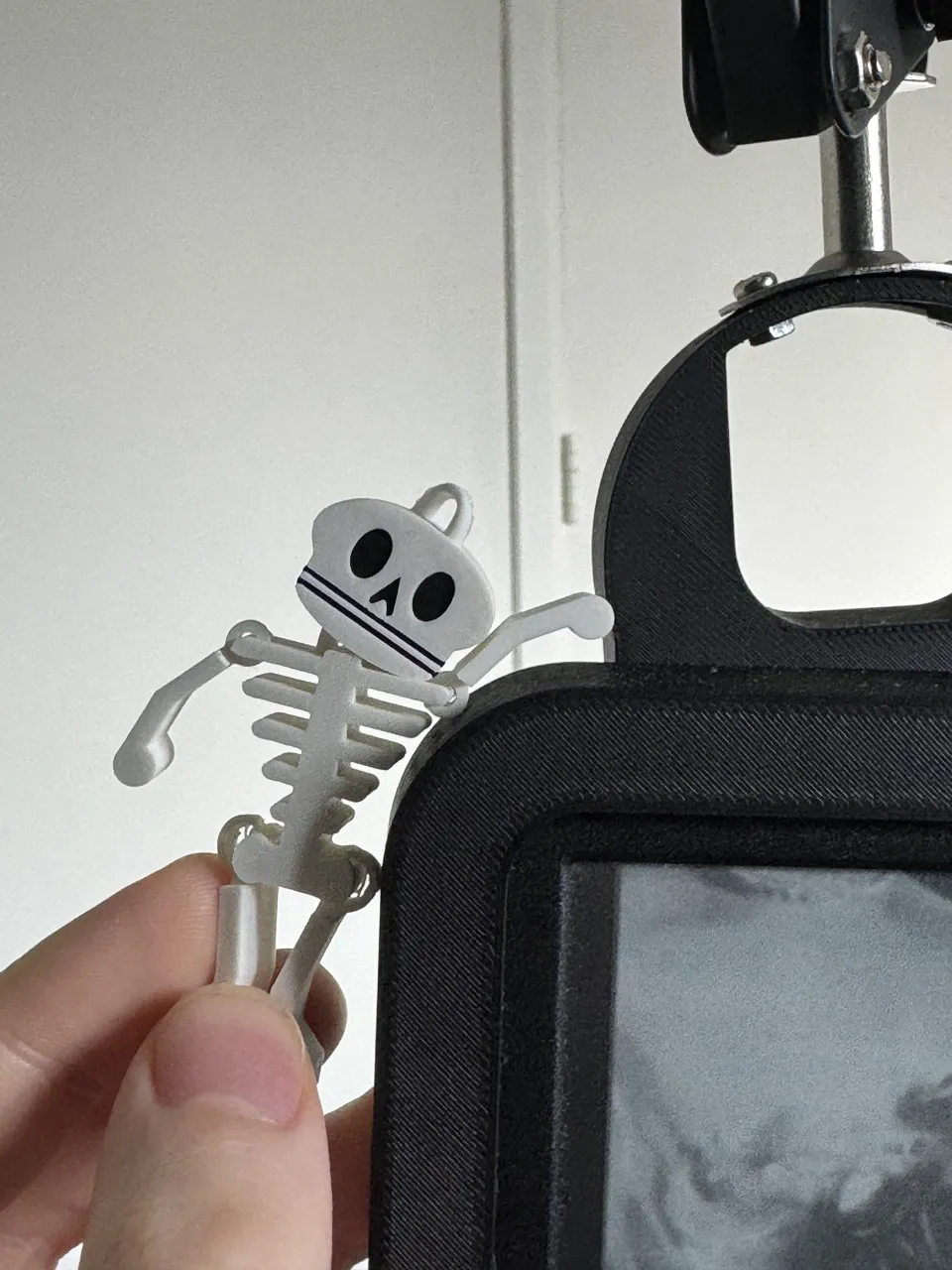 Halloween skeleton earring dangles view 2