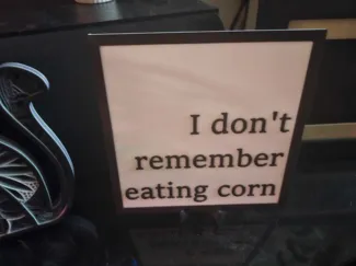 I don't remember eating corn bathroom sign