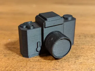 Miniature vintage analog SLR camera