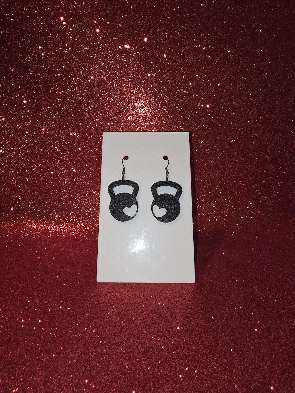 Love kettlebell earrings view 2
