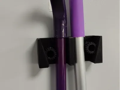 Gravity broom and dustpan holder